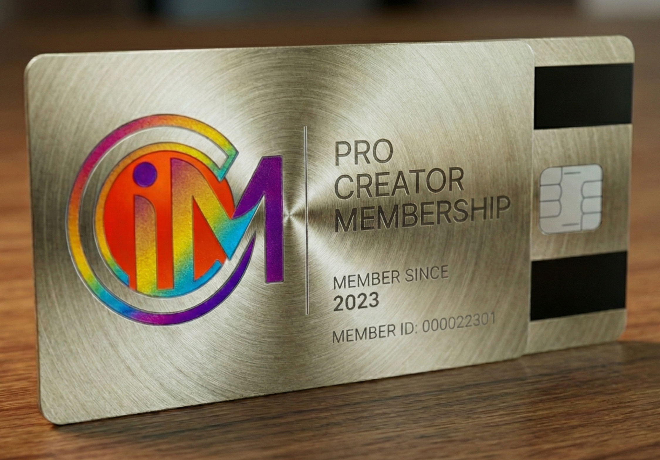 Metallic card with colorful logo and text on a wooden surface